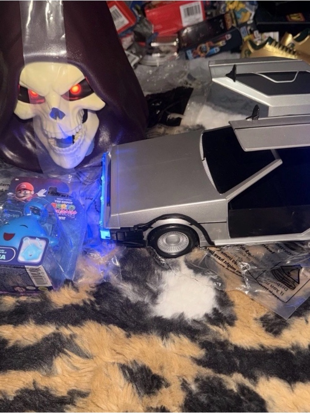 Popcorn Bucket Skeletor, & back to the future DeLorean Car with Gullwing Doors